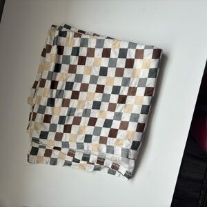 Milk berry checkered swaddle blanket